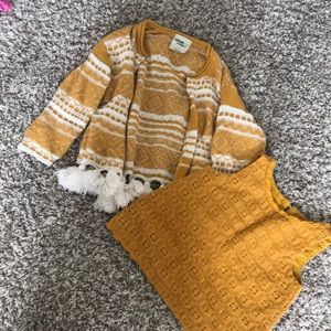 Frilly sweater and tank closet closing